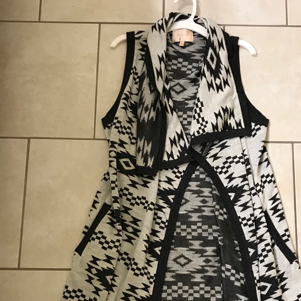 long, sleeveless sweater!
